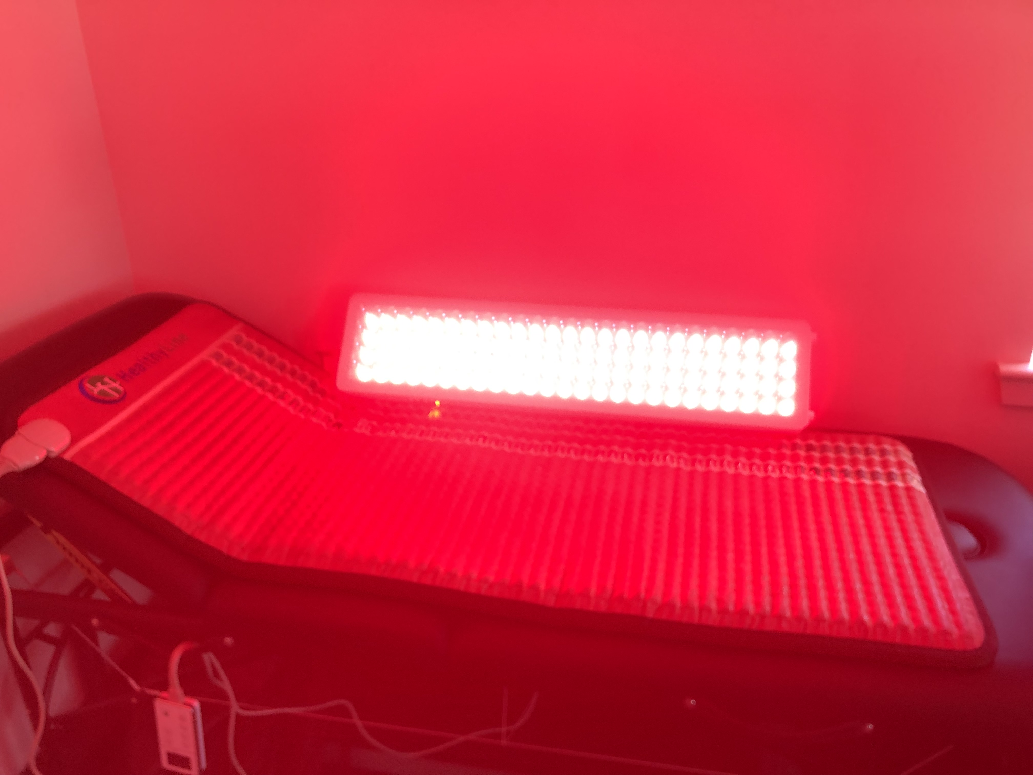 Infrared light and PEMF mat in the gym area
